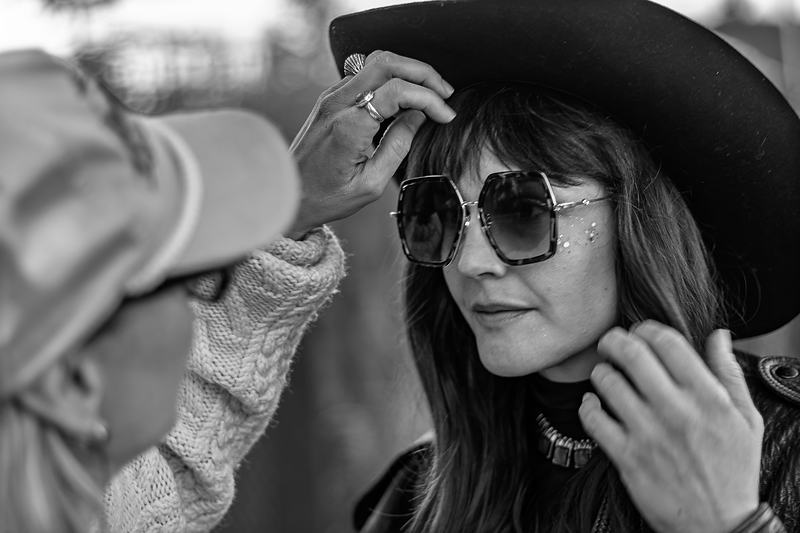 Black and white portrait of the Rainy Eyes vocalist in a hat and sunglasses, live music photography by Tara Lenehan