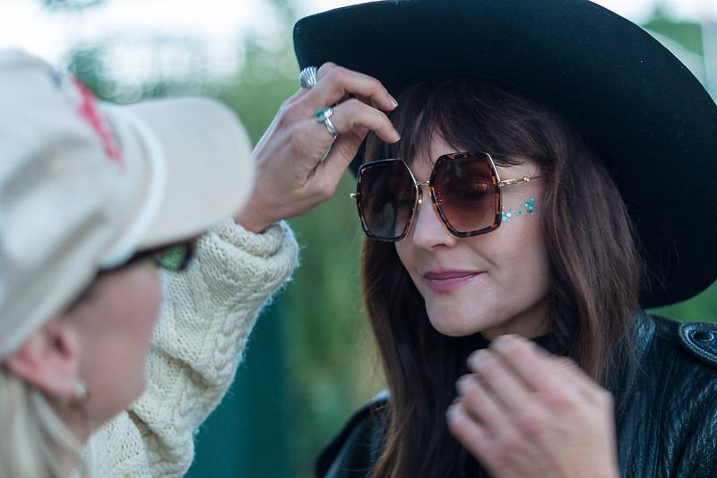 The vocalist of Rainy Eyes in a hat and sunglasses during a candid portrait in Winter Park